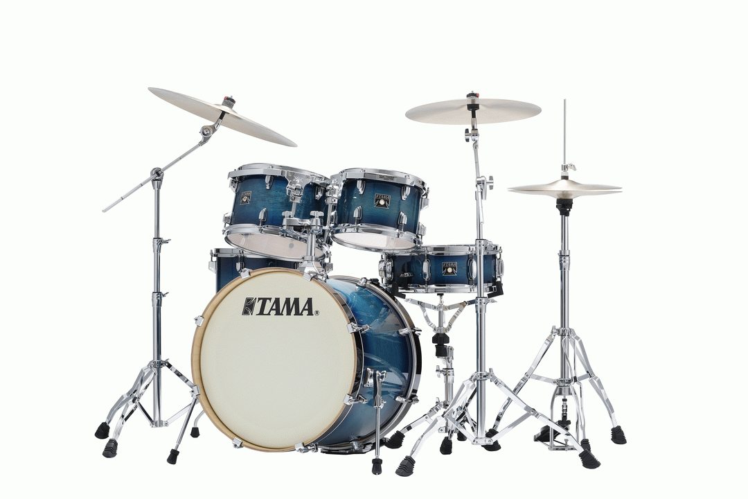 Tama Superstar Classic 20-inch 5-piece drum kit shell pack in blue lacquer burst with drums and hardware visible.