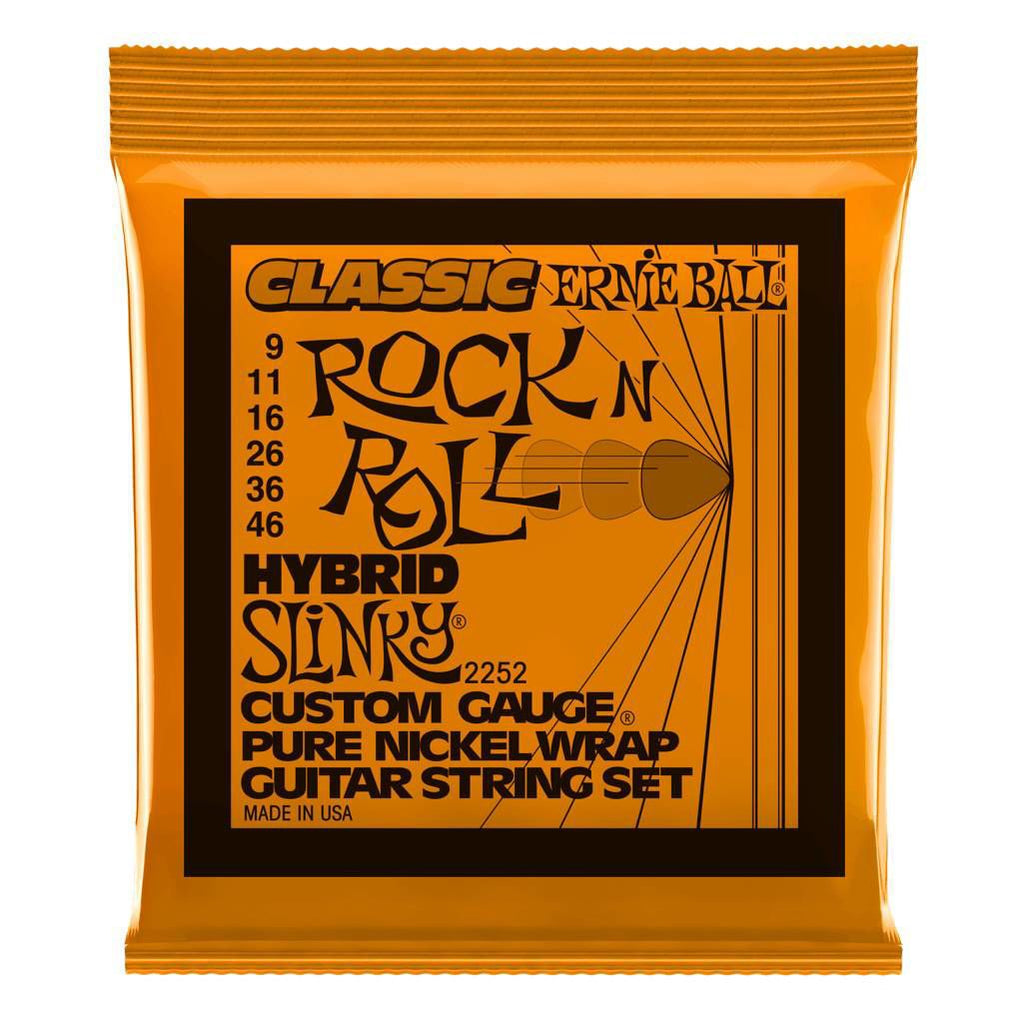 Ernie Ball Hybrid Slinky Classic Rock n Roll 9-46 electric guitar strings on a coil, branded packaging visible.