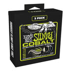 Ernie Ball Regular Slinky Cobalt electric guitar strings in lime color, 10-46 gauge, three sets arranged on a guitar.