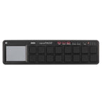 Black Korg nanoPAD2 MIDI controller with slim design, featuring drum pads and control knobs for music production.