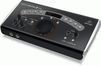 Behringer Xenyx Control 2 USB studio control interface with knobs and switches for audio monitoring and editing.