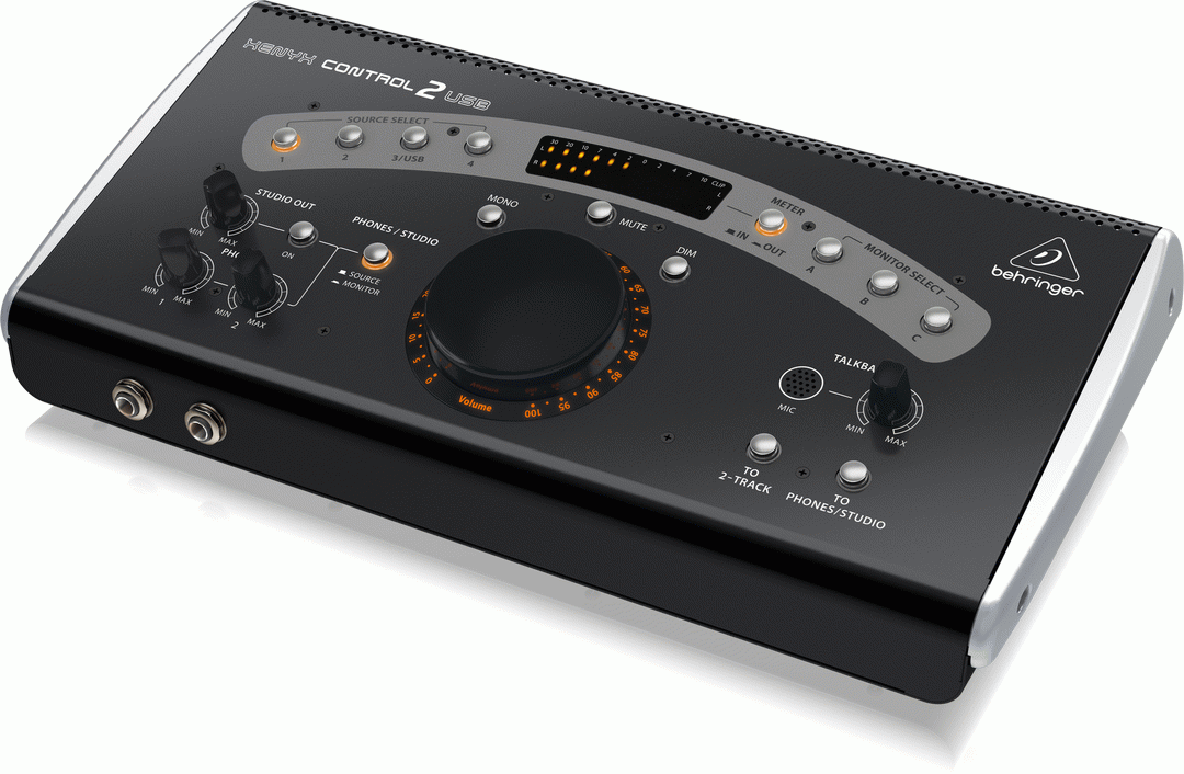 Behringer Xenyx Control 2 USB studio control interface with knobs and switches for audio monitoring and editing.