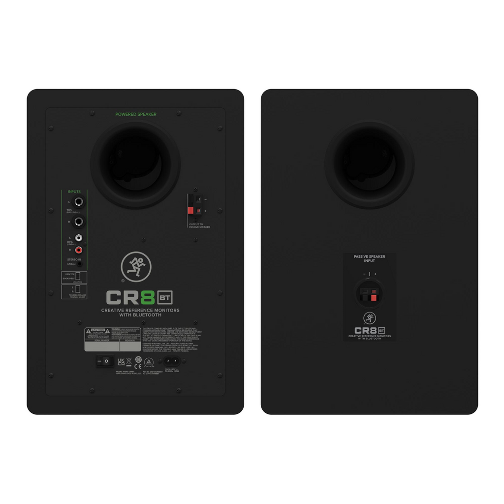 Mackie CR8BT powered studio monitors with tone control and Bluetooth, showing front view and control knobs on the speakers.