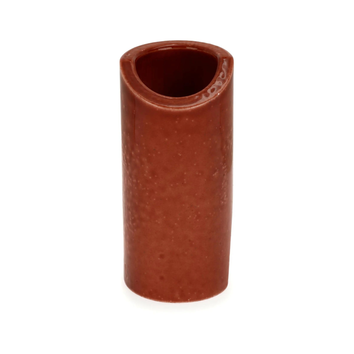 Small ceramic Tucson guitar capo from The Rock Slide, designed for easy tuning and secure grip on acoustic and electric guitars.