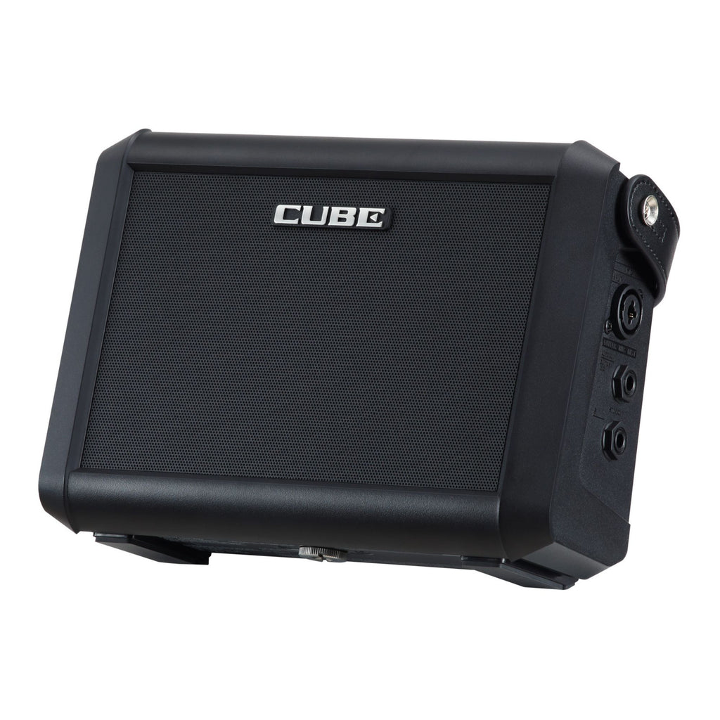 Roland Cube Street Mini guitar amplifier with two speakers, controls, and built-in handles for portable sound.