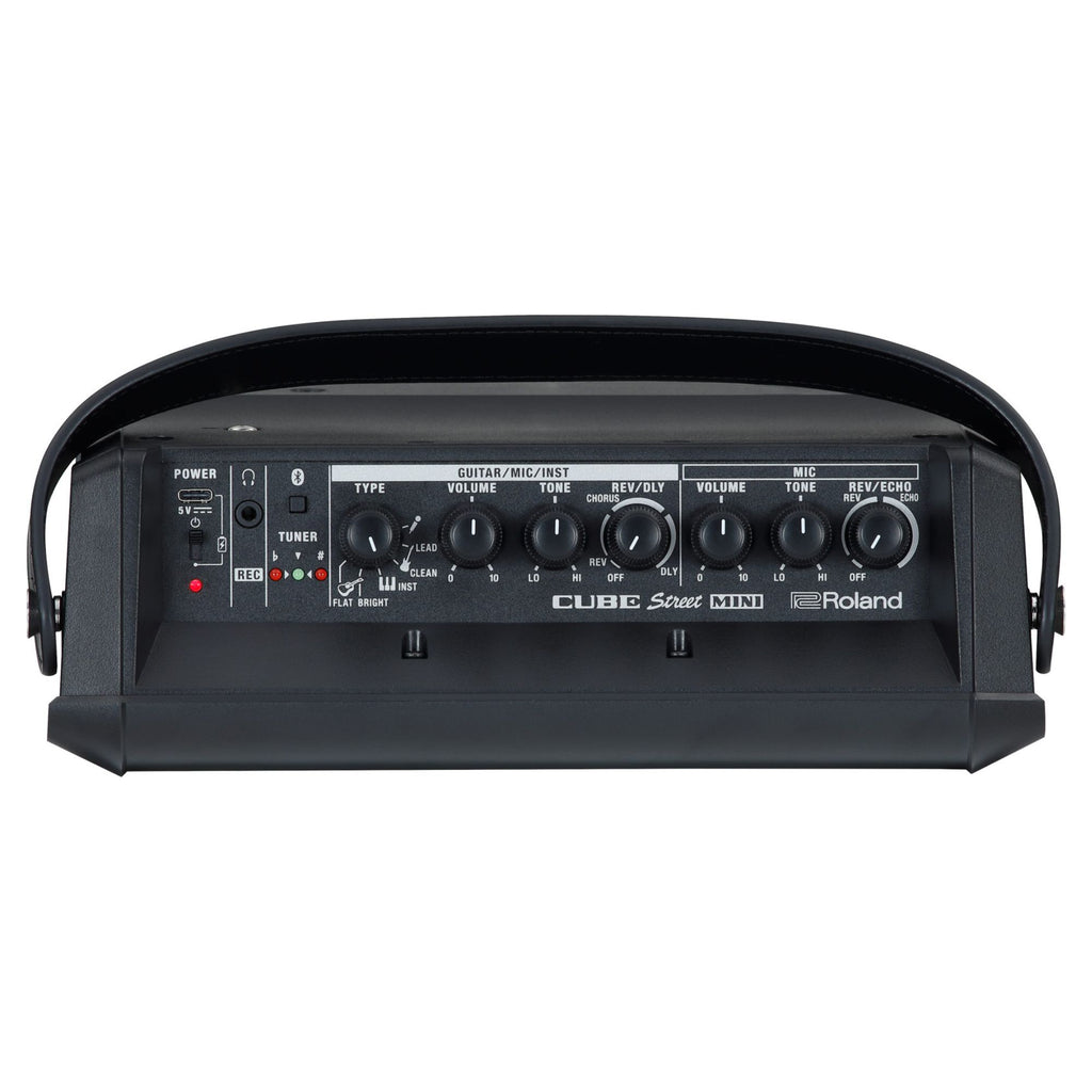 Roland Cube Street Mini guitar amplifier with portable design, featuring control knobs and input jacks, ideal for street and practice use.