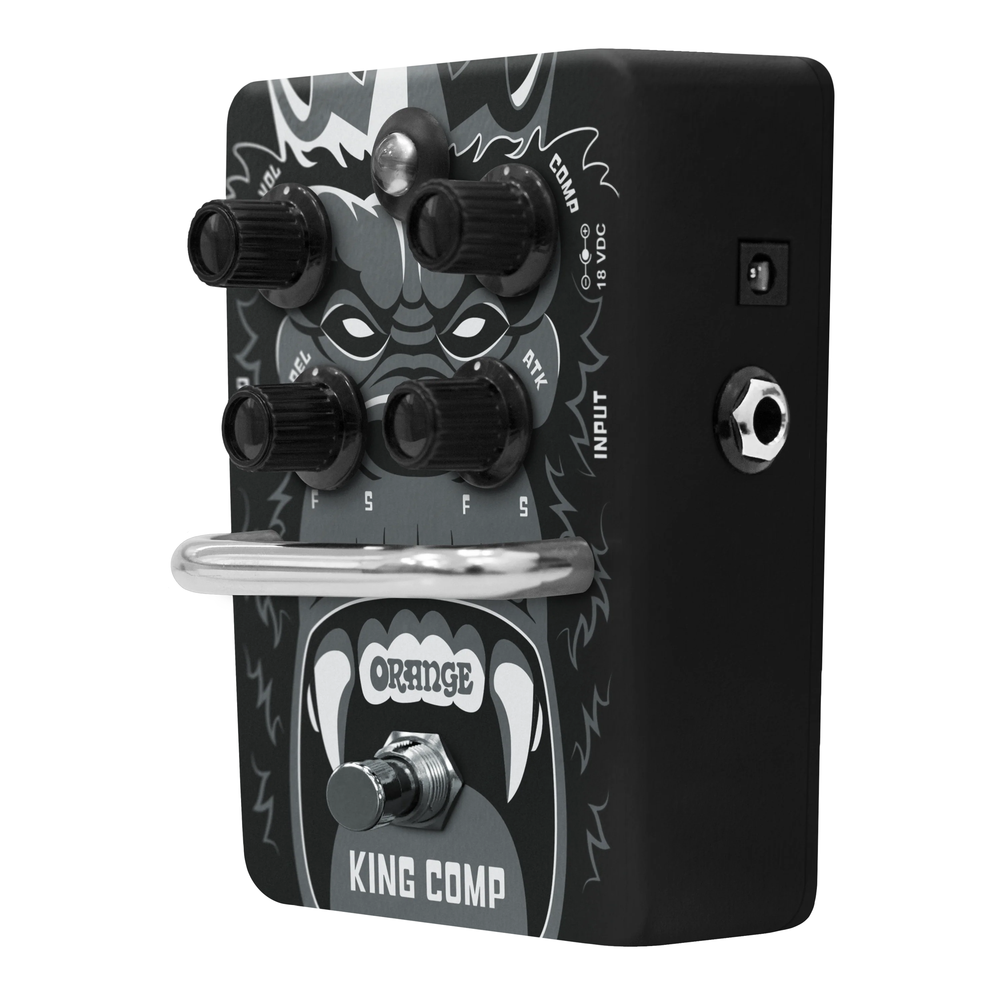 Orange King Comp VCA Compressor Pedal for guitar effects, showing the compact orange pedal with control knobs and input/output jacks.