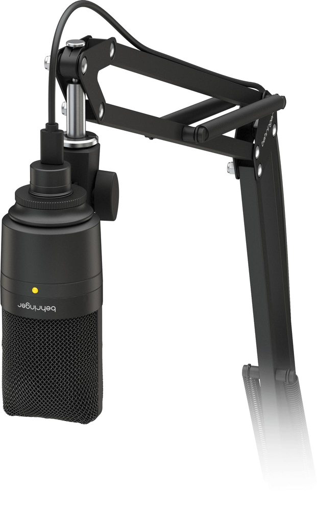 Behringer D3 USB microphone from the podcast studio microphone bundle, showing the black microphone with stand and cable.