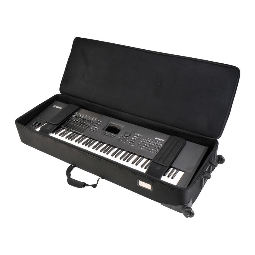 SKB soft case for 88-note keyboards, padded black keyboard bag with handles and zippers, designed for easy transport and protection.