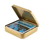 D'Addario 50th Anniversary Collectors Tin with EJ16 and EXL110 guitar picks, displayed inside a decorative collector's tin.