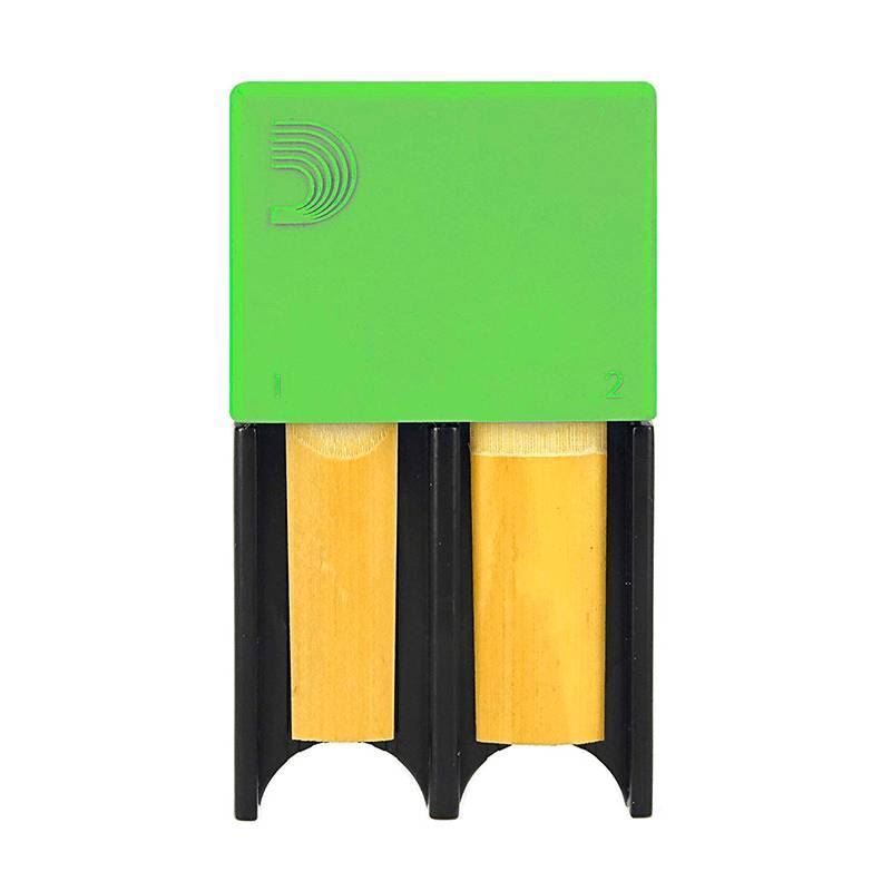 Green D'Addario Rico Planet Waves Reed Guard for brass and woodwind instruments, designed to protect reeds and prevent damage.