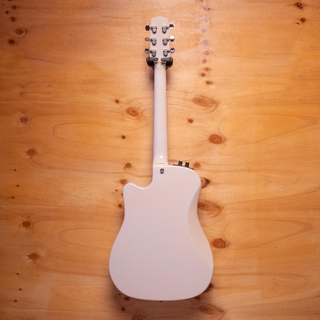 Preloved Daion hybrid electric acoustic guitar made in Japan, showing the body and neck with detailed wood grain.