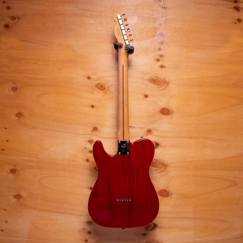 Fender Player II Telecaster electric guitar in transparent cherry finish with maple neck and single-cutaway body.