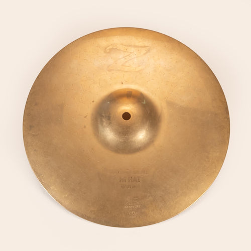 Zildjian 13-inch Dyno Beat "Bottom Only" hi-hat cymbal, preowned, showing the textured surface and brand logo.