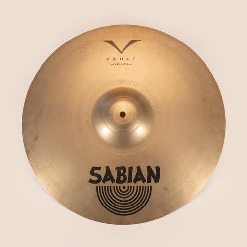 Sabian 18-inch Vault Crash Cymbal, preowned, showing its shiny surface and detailed bell, ideal for versatile percussion sounds.