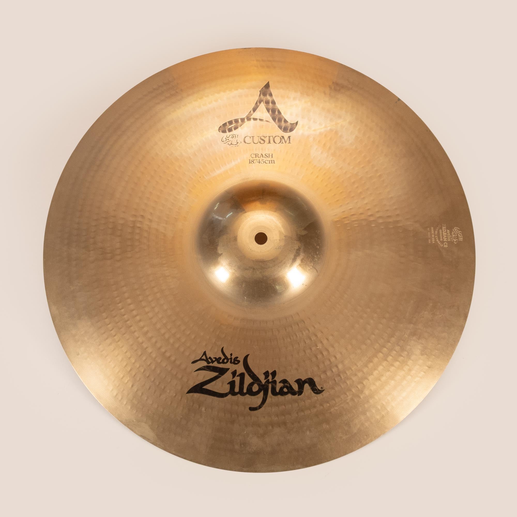 Preloved Zildjian 18-inch A Custom Crash Cymbal with a shiny bronze finish and detailed branding, designed for cymbal crashes.