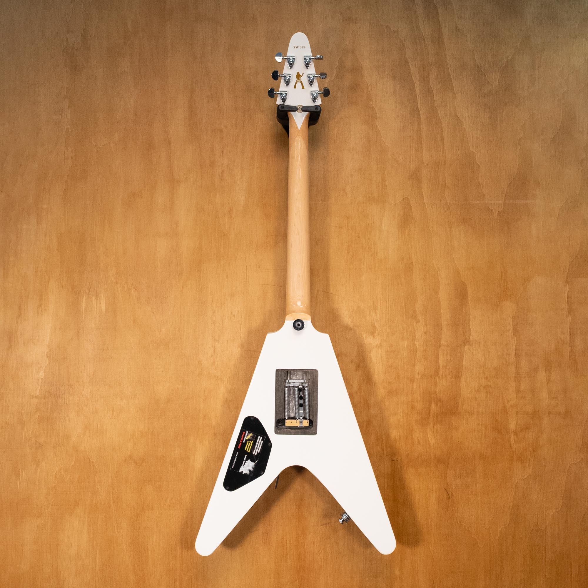Preloved Gibson Copy Bullseye Flying V electric guitar, black and white design, body, neck, and headstock visible in the image.