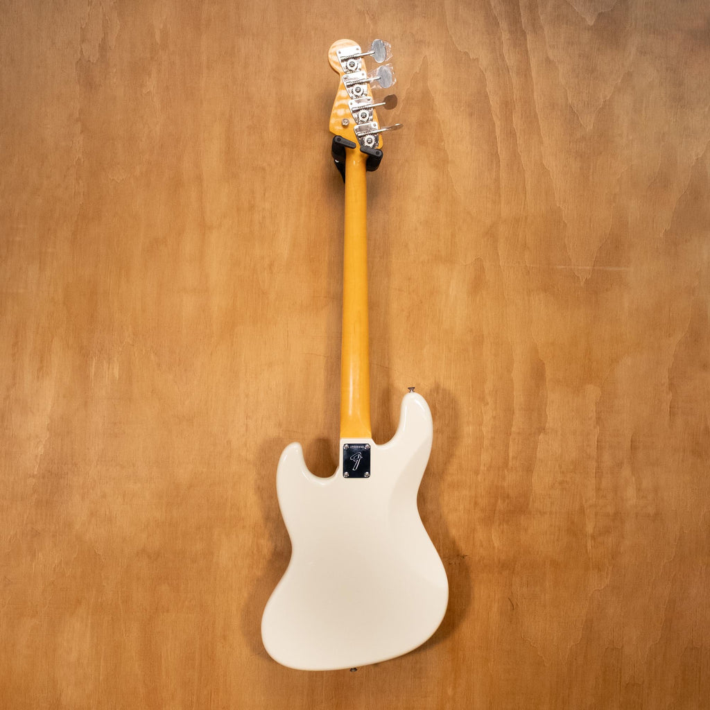 Fender American Vint II 1966 Jazz Bass guitar in Olympic White, showcasing the body and neck details of this preowned bass guitar.