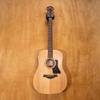 Taylor Big Baby acoustic guitar in walnut finish with pickup, showing the front view of this preowned Taylor guitar.
