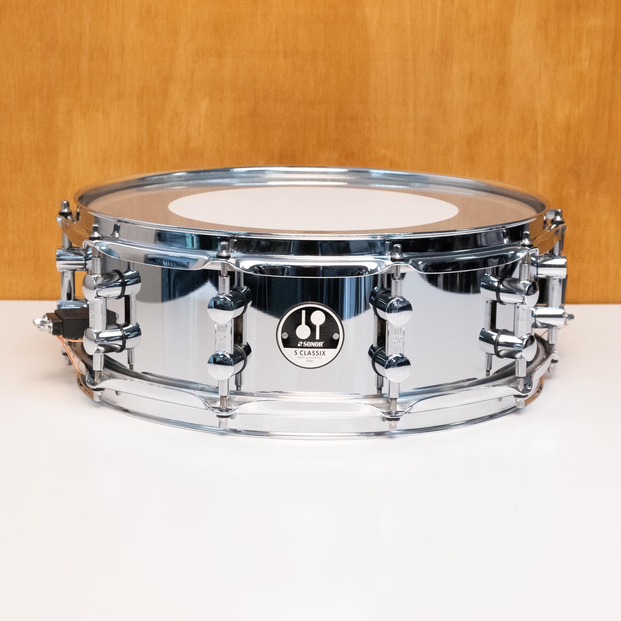 Preloved SONOR SC-1405SDS 14-inch steel snare drum showing drum shell and hardware details.