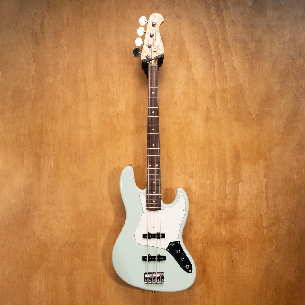 Preloved Fujigen Neo Classic KNJB10RBD bass guitar, showcasing its sleek body and headstock in a detailed close-up image.