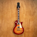 Epiphone Les Paul Standard '50s electric guitar in Heritage Cherry, showcasing its solid body, humbucker pickups, and vintage finish.