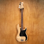 Fender Precision Bass PB70-70US in Olympic White with maple fingerboard, shown in a close-up view of the bass guitar.