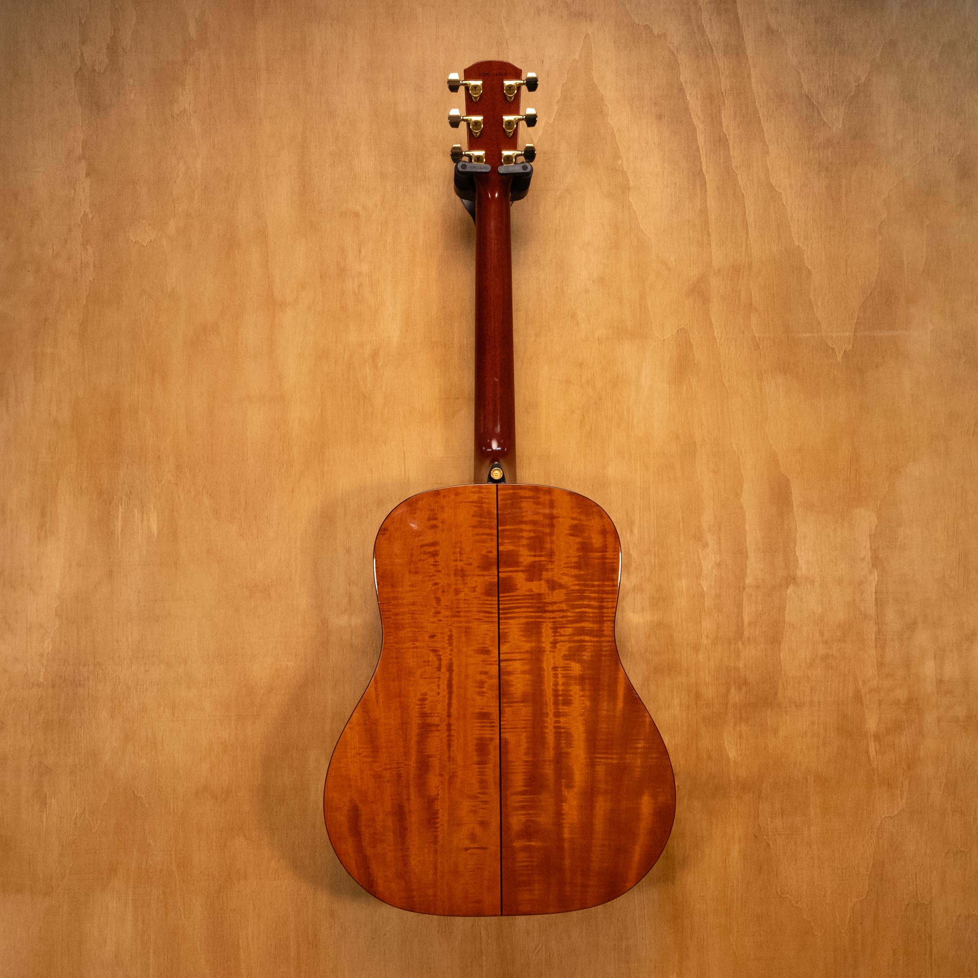 K. Yairi AY65 dreadnought acoustic guitar in sunburst finish, featuring a natural wood body and six-string design.