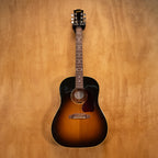 Gibson J-45 Standard acoustic guitar with sunburst finish, showing the body, soundhole, and guitar strings.