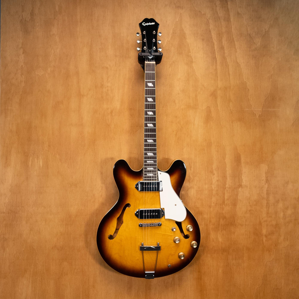 Epiphone Casino electric guitar made in Korea, 2005 model, with sunburst finish and double-cutaway body, close-up of the instrument.