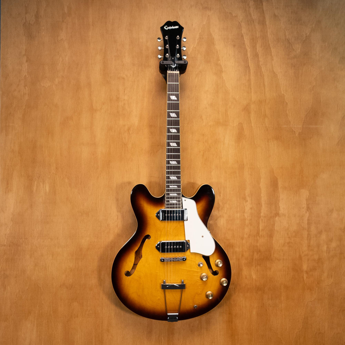 Epiphone Casino electric guitar made in Korea, 2005 model, with sunburst finish and double-cutaway body, close-up of the instrument.