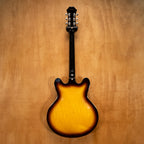 Epiphone Casino electric guitar made in Korea, 2005, with sunburst finish and dual humbuckers, shown in a close-up shot.