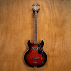 Preloved Aria Diamond Hollow Body Electric Bass guitar with sleek design and glossy finish, showcasing its elegant curves and hardware.