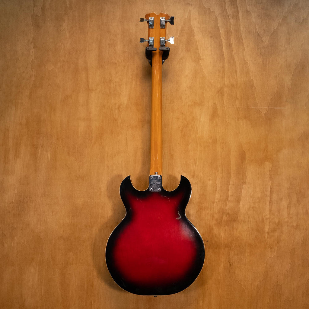 Preloved Aria Diamond Hollow Body Electric Bass guitar with a sleek design and polished finish, showcasing its stylish appearance.