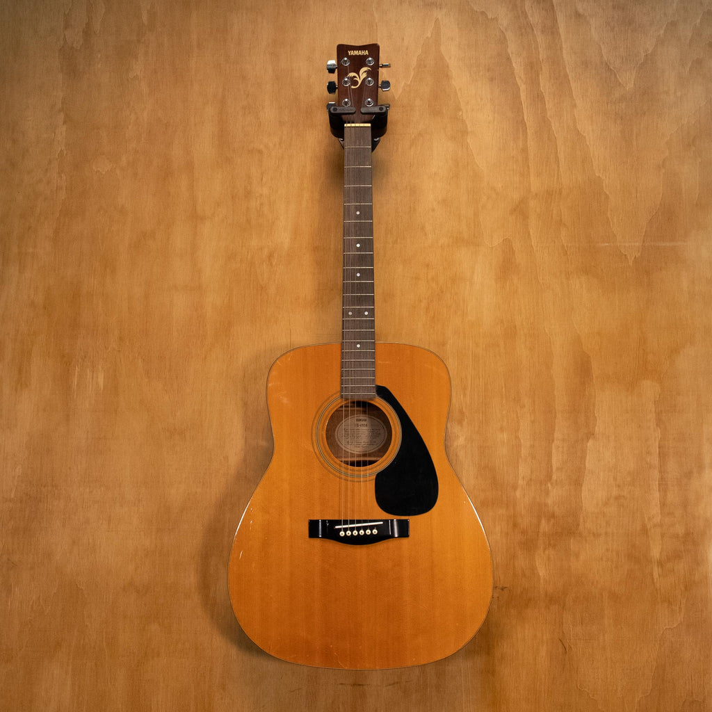 Yamaha FG410A acoustic guitar with a natural wood finish, six-string body, and traditional dreadnought shape.