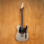 Fender Standard Telecaster HH electric guitar in Ghost Silver, showing the solid body, pickups, and maple neck.