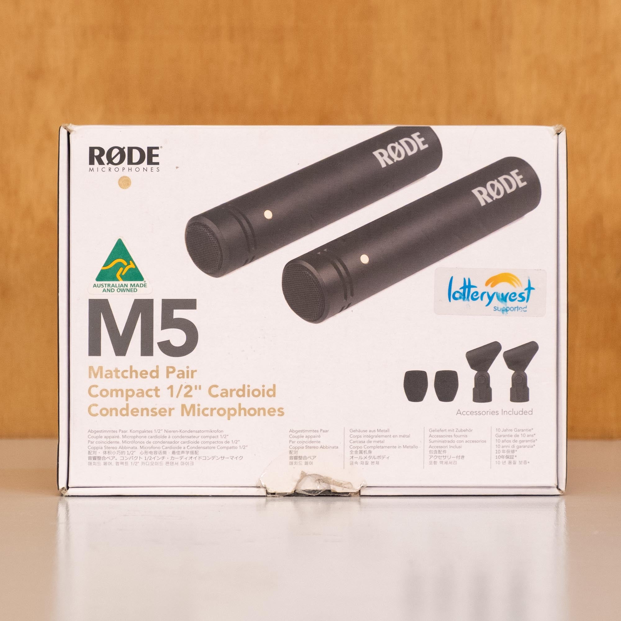 Pair of Rode M5 wired cardioid condenser microphones, compact and professional for live sound applications, shown on a plain background.