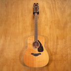 Yamaha FG720S-12 12-string acoustic guitar with a natural wood finish, six pairs of steel strings, and a classic dreadnought shape.