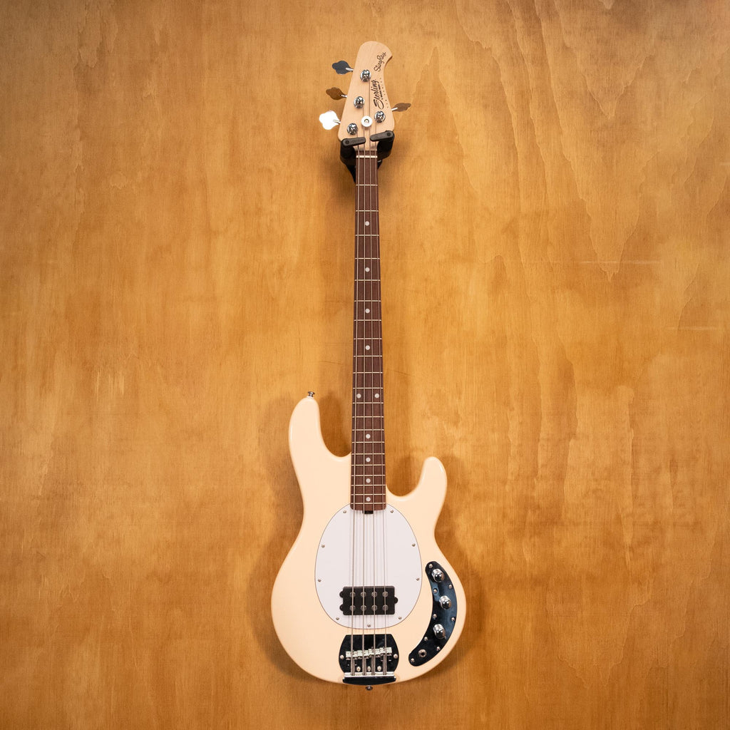 Preloved Sterling by Music Man Sting Ray bass guitar from the Sterling Sub Series, with a sunburst finish and four-string design.