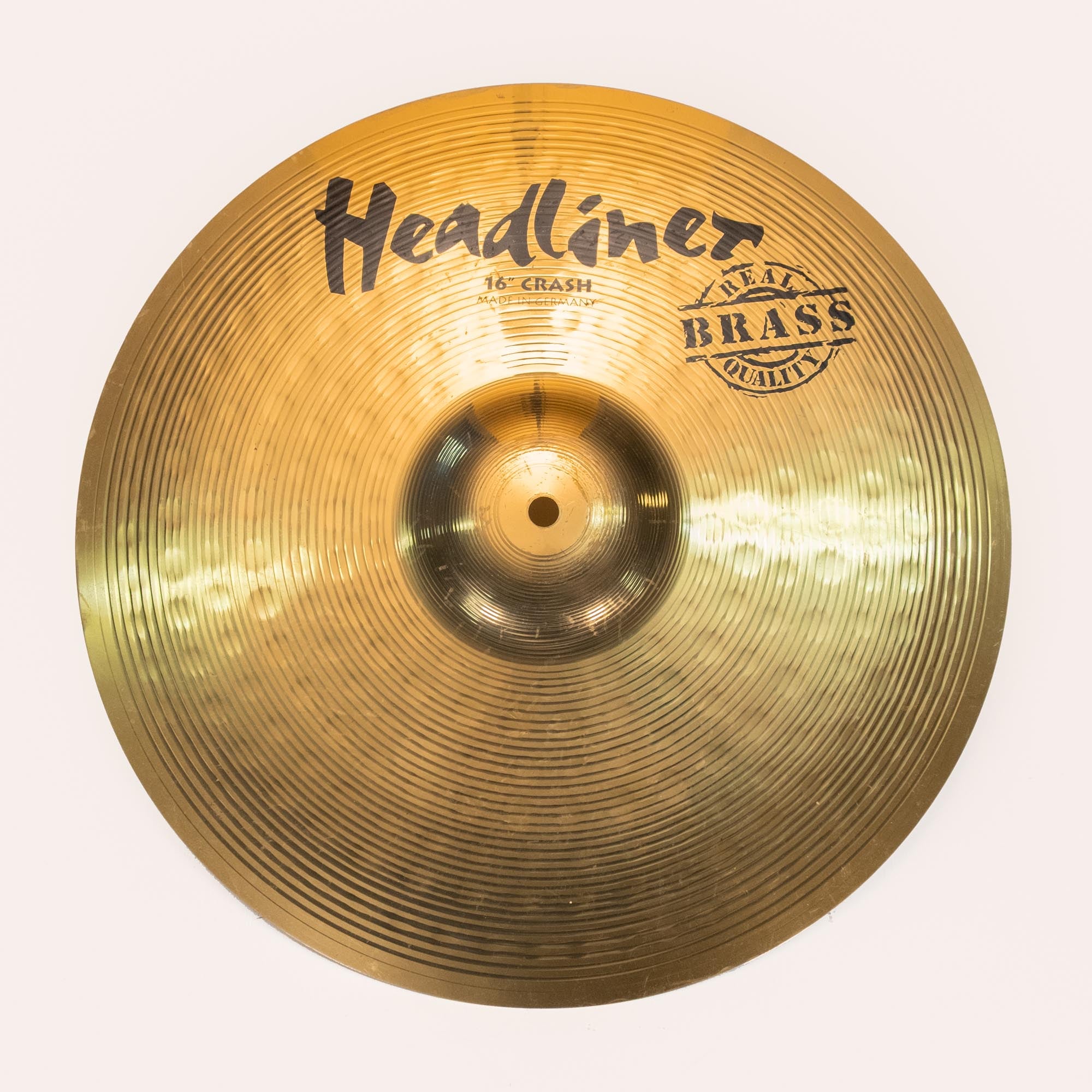 Preloved Headliner 16-inch crash cymbal, single cymbal for drums, showing its worn metal surface and brand logo.