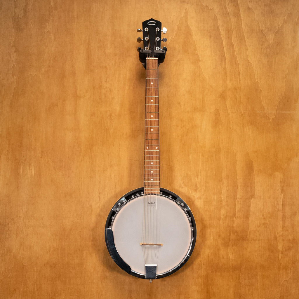 Preloved Cort 6-string folk and bluegrass Git-Banjo with wooden body, metal strings, and tuning pegs, ready for music enthusiasts.