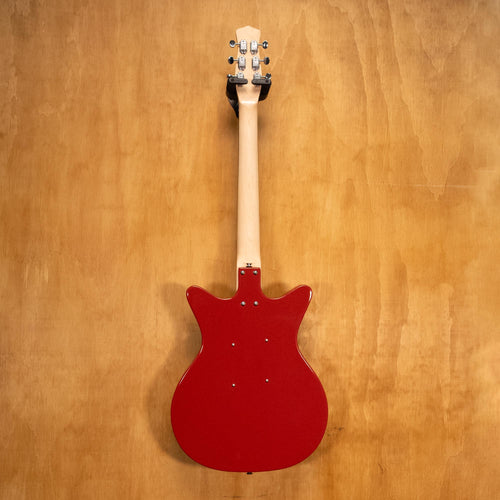 Danelectro Stock '59 electric guitar in red with vintage-style body and chrome hardware, showcasing its classic design and dual pickups.
