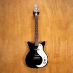 Danelectro '59M NOS electric guitar in black with chrome hardware and vintage-style pickups, shown on a plain background.