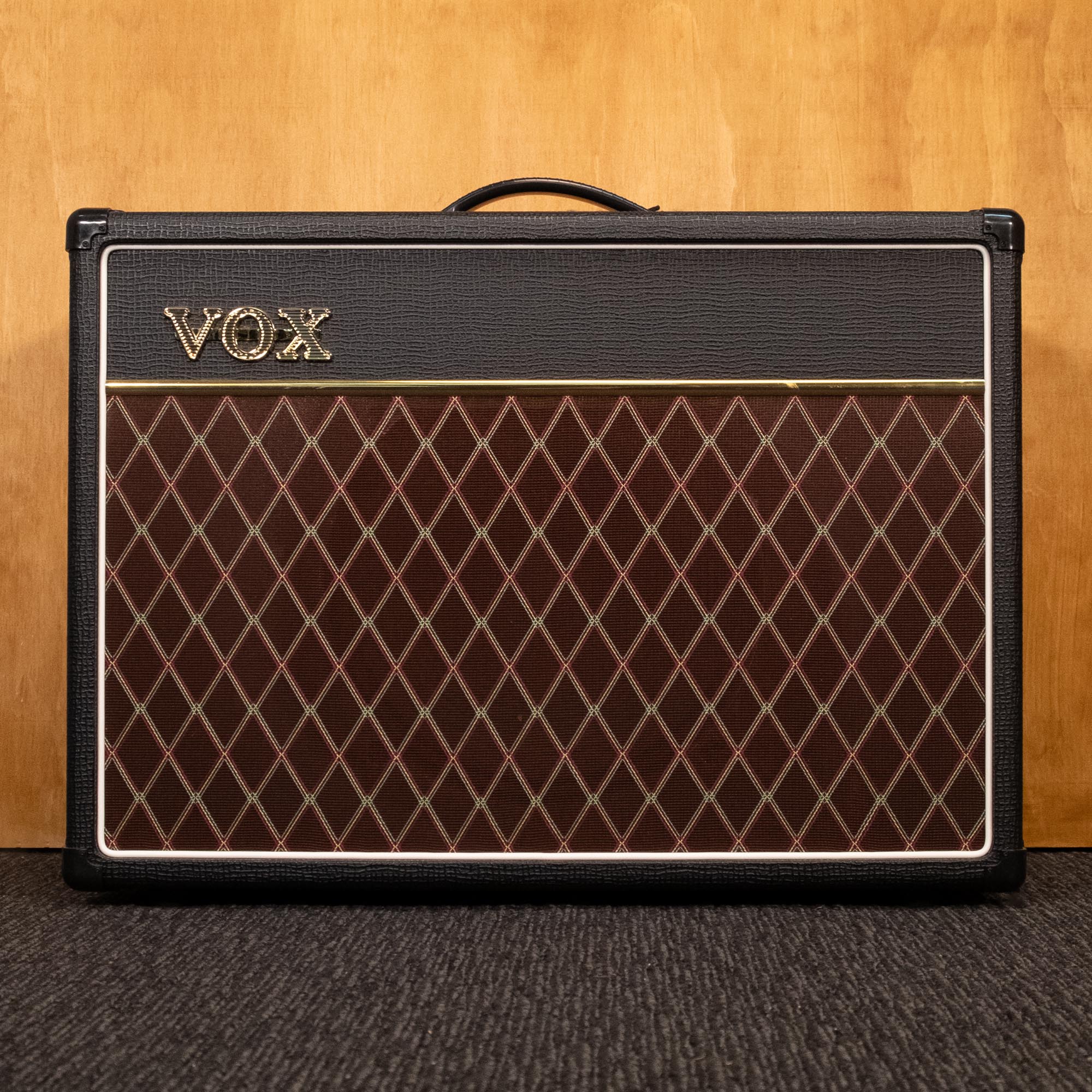 Vox AC15C1X guitar amplifier combo with vintage-style control panel and speaker grille, used condition.
