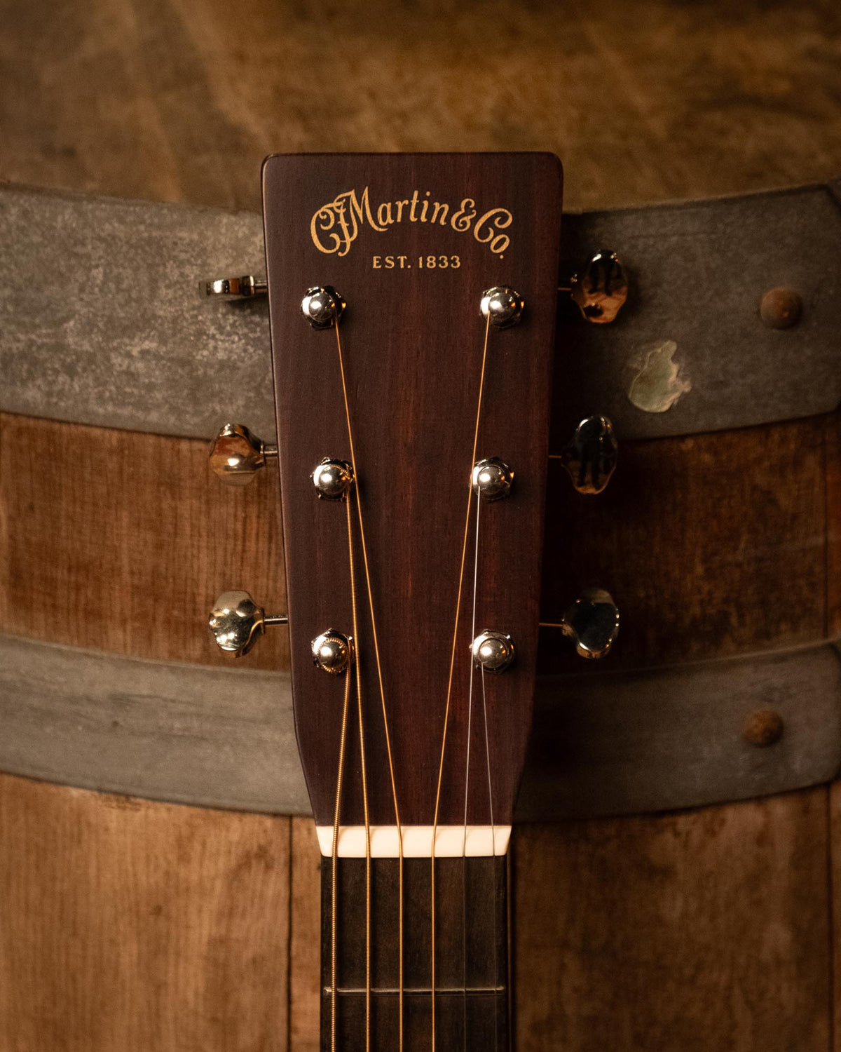 Martin Custom Shop Style-28 0-14 Adirondack and Cocobolo acoustic guitar, showcasing its body and wood grain details.