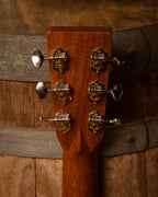 Martin Custom Shop Style-28 acoustic guitar with Adirondack and cocobolo wood, showcasing a polished wood finish and detailed craftsmanship.