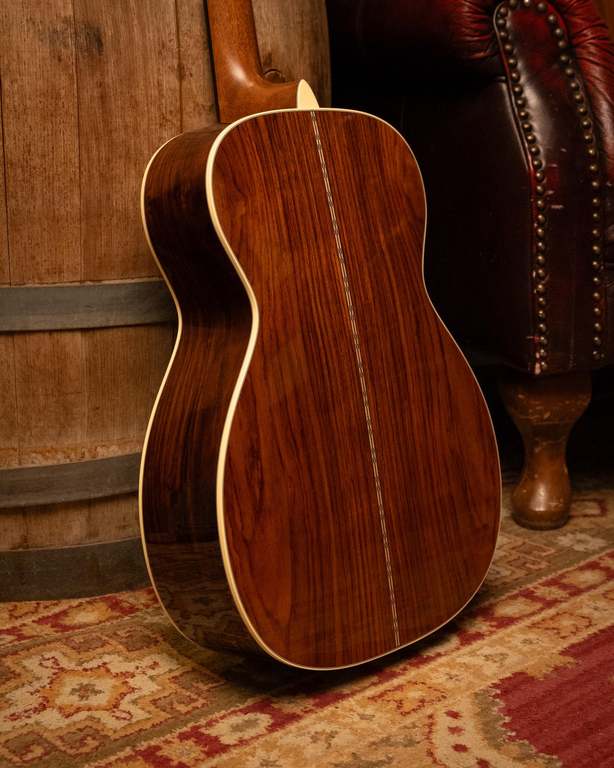 Martin Custom Shop Style-28 0-14 Adirondack/Cocobolo acoustic guitar with detailed wood grain and classic dreadnought shape.