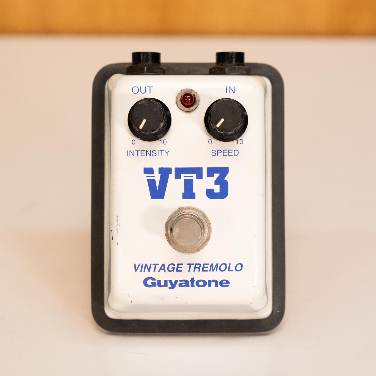Guyatone VT3 Vintage Tremolo guitar effects pedal, preowned, showing control knobs and input jack on a black pedal with silver accents.