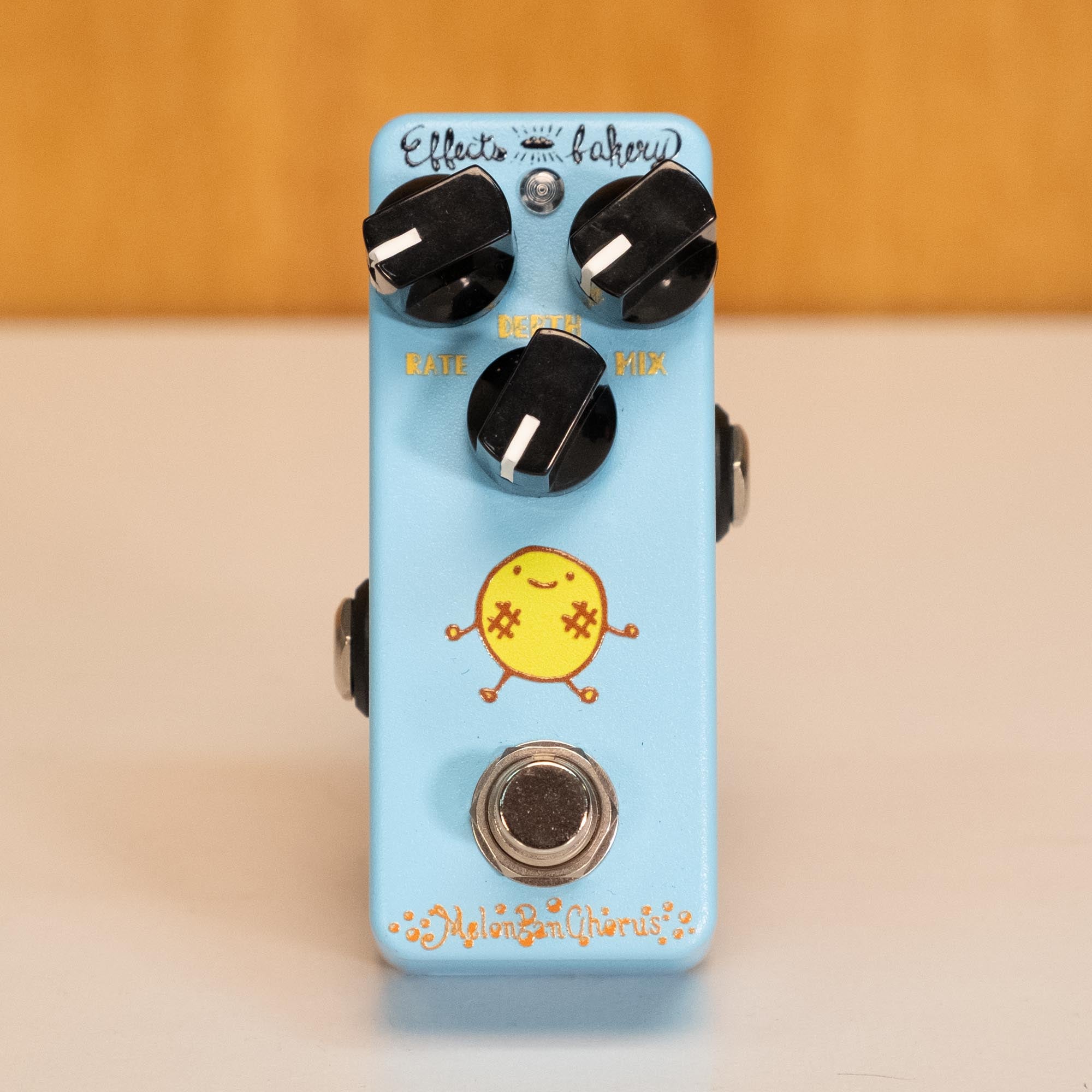 Effects Bakery EB-MPC Melon Pan Chorus guitar effects pedal, close-up view showing controls and branding.