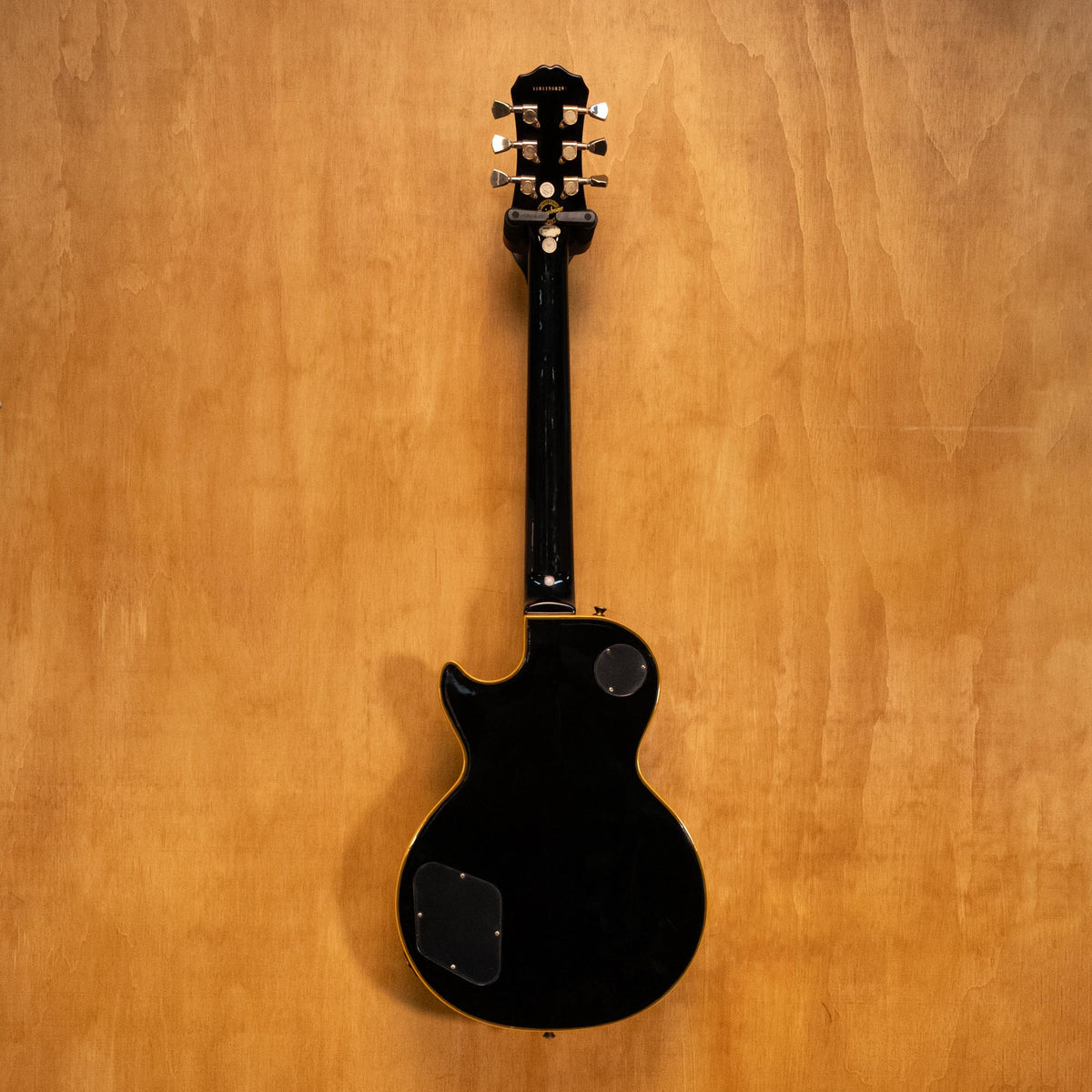 Epiphone LTD Les Paul Custom Classic electric guitar in antique ebony with gold hardware and dual humbucker pickups.